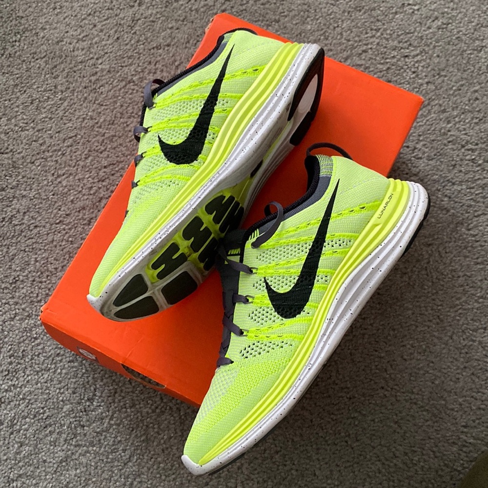 Nike Women’s Neon Yellow and Black Flyknit Running Shoes